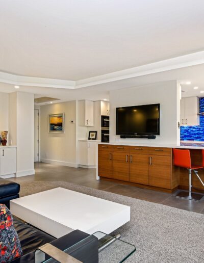 A living room with a couch and tv.